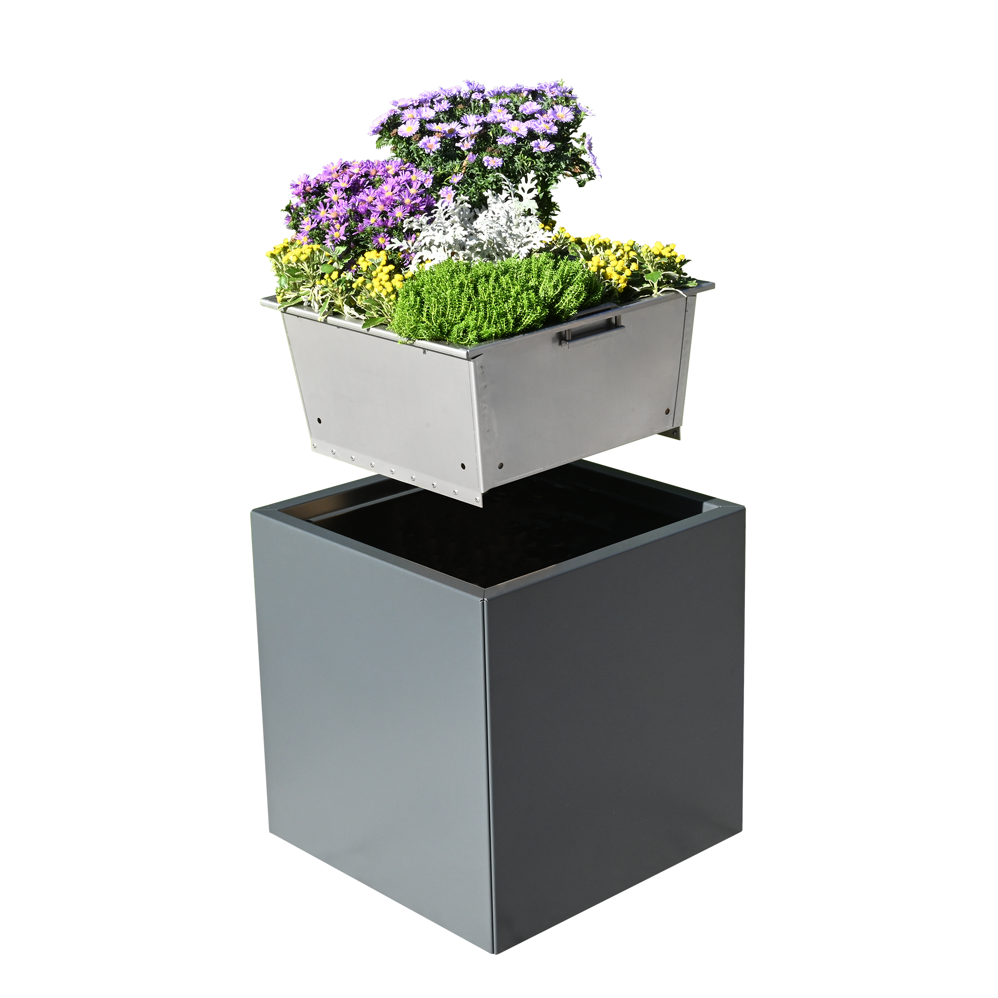 Der Pflanzkasten Duplex hat einen entnehmbaren Pflanzkübel der mit bunten Pflanzen bestückt wurde
