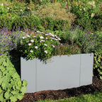 Modularer Pflanzkasten aus Aluminium im Garten bepflanzt